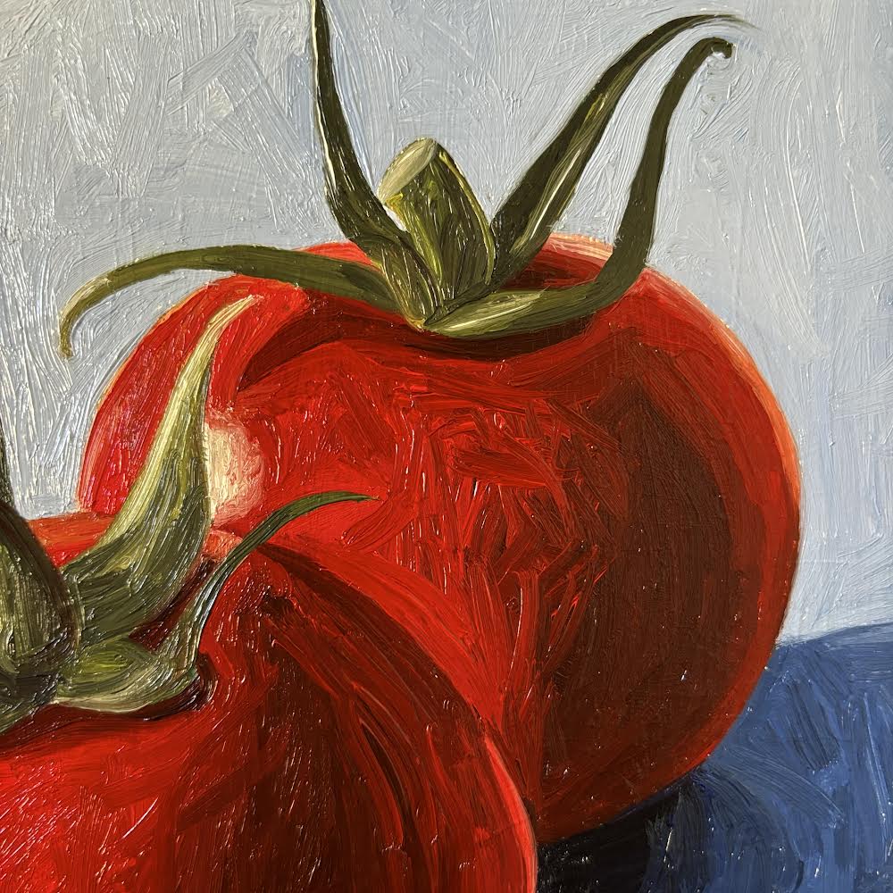 Tomatoes on blue