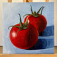 Tomatoes on blue