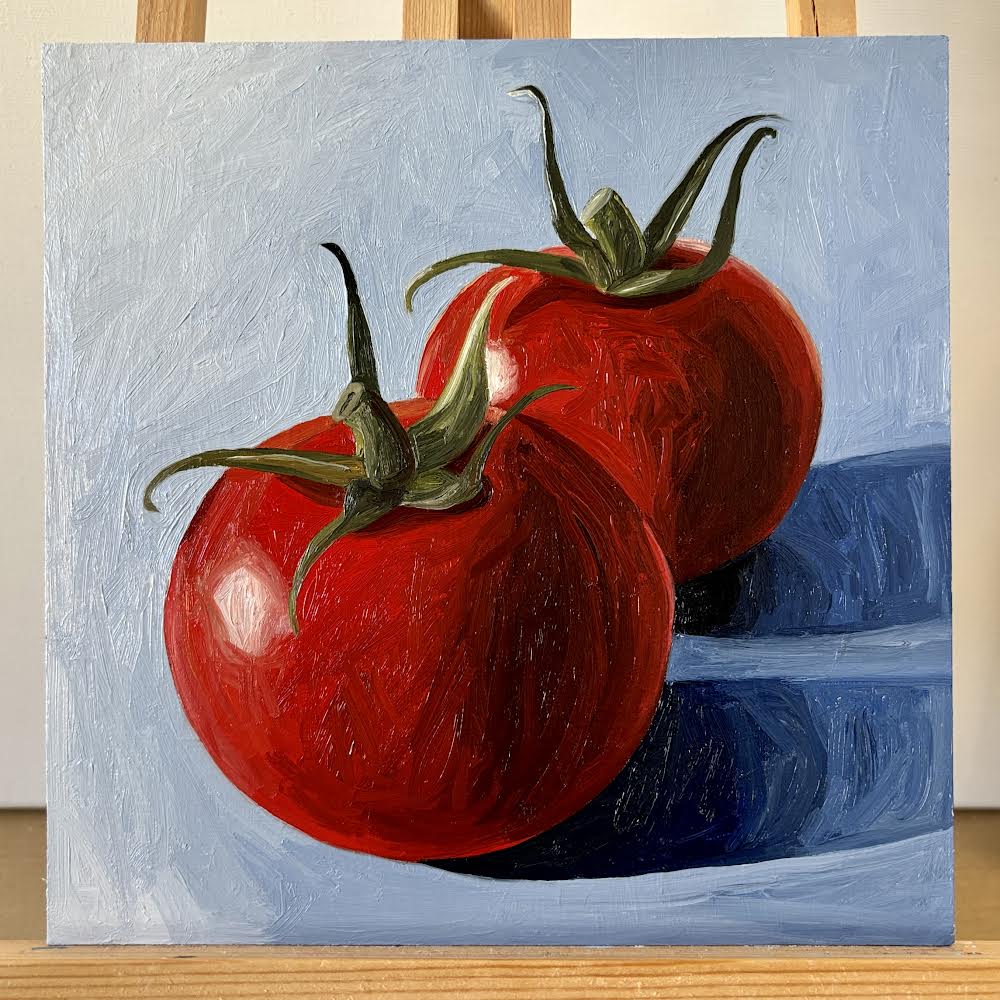 Tomatoes on blue