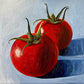 Tomatoes on blue