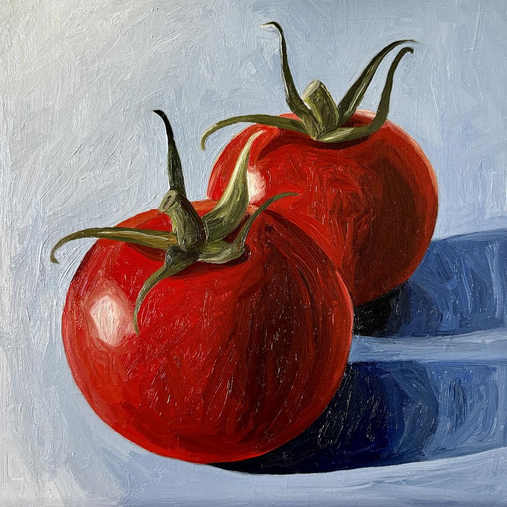 Tomatoes on blue