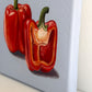 Red Peppers on Blue