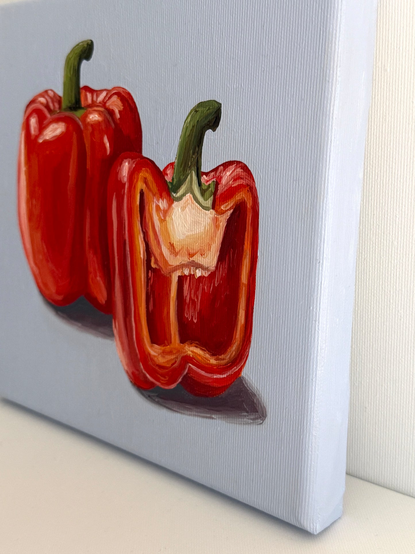 Red Peppers on Blue
