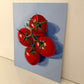 Four Tomatoes on Blue