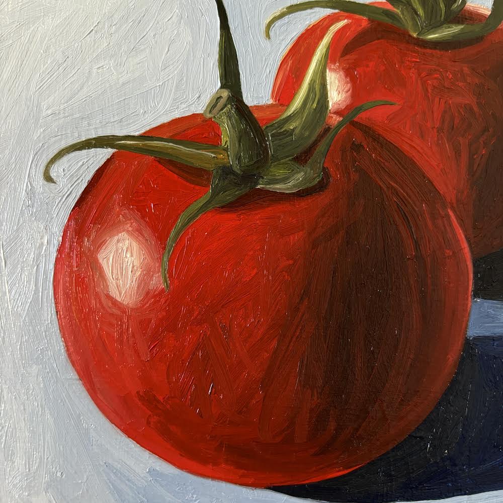 Tomatoes on blue