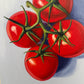 Four Tomatoes on Blue