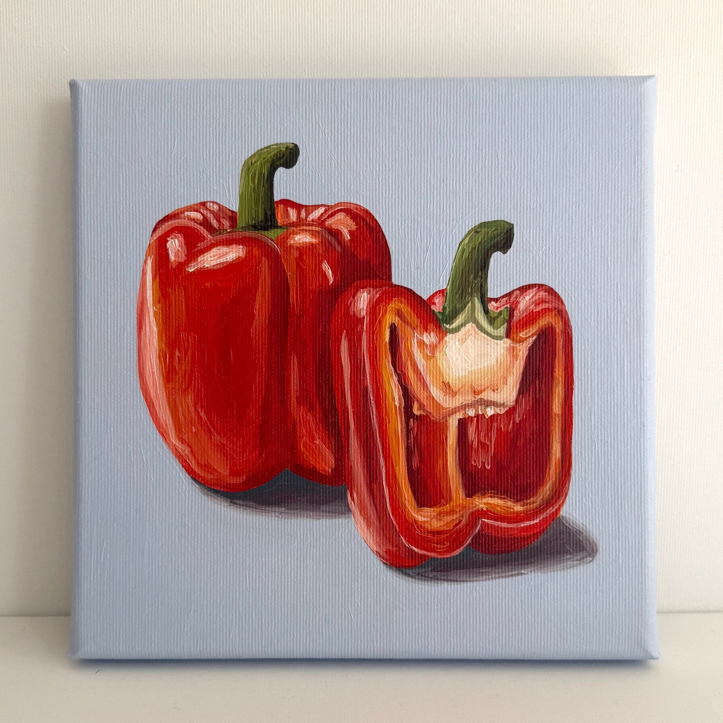 Red Peppers on Blue